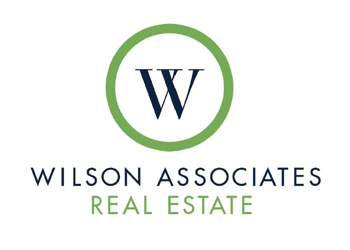 Wilson Associates Real Estate logo