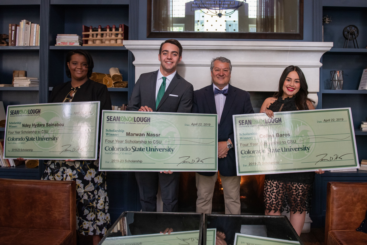 Ron Martinez, LIV Sotheby’s International Realty broker, presents three full-ride scholarships to CSU. This is made possible from the Sean Ranch Lough Foundation. 