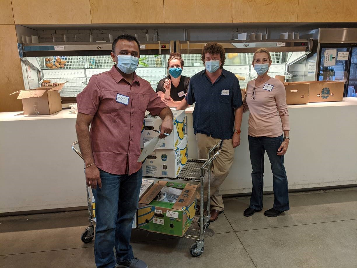 Niral Patel, Michelle Schroeder, James Kramer and Judi Newbold of the Berkshire Hathaway HomeServices Chicago Lincoln Park Clybourn office assisted The Lakeview Pantry during the firm’s all-company Community Kindness event.