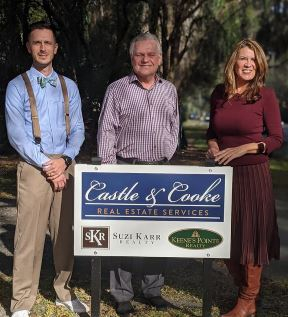 Pictured, from left, are Chris Sapp (Broker Suzi KarrRealty/Castle & Cooke Real Estate Services), Bob Hennen and Angela Durruthy (Broker for Keene’s Pointe Realty).
