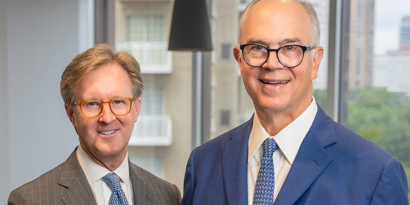 President Russ Anderson, left, and CEO Robbie Briggs at the Dallas/Turtle Creek office of Briggs Freeman Sotheby’s International Realty, October 12, 2021
