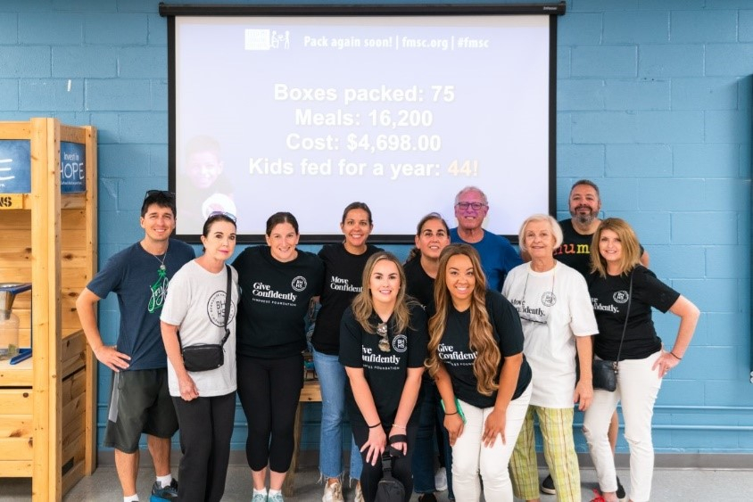 Northbrook office BHHS Chicago agents and staff volunteered at Feed My Starving Children during 2023 Community Kindness.