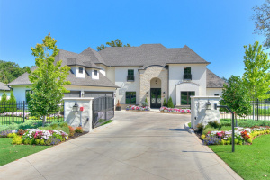 One of a kind custom on a large 1 plus acre lot in South Tulsa, Jenks schools