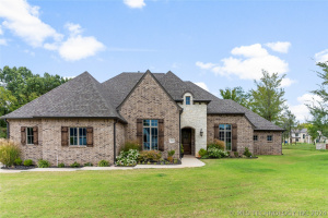 0.93 acres in Broken Arrow's sought after gated, The Woods of Jasper Estates.
