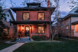 Step into the timeless elegance of a meticulously reimagined 1912 Denver Square