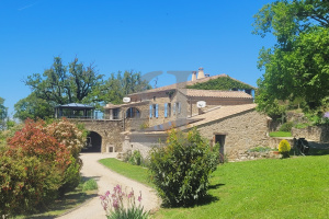 Stone property nestled in 9 hectares of land in superb surroundings in La Bég...